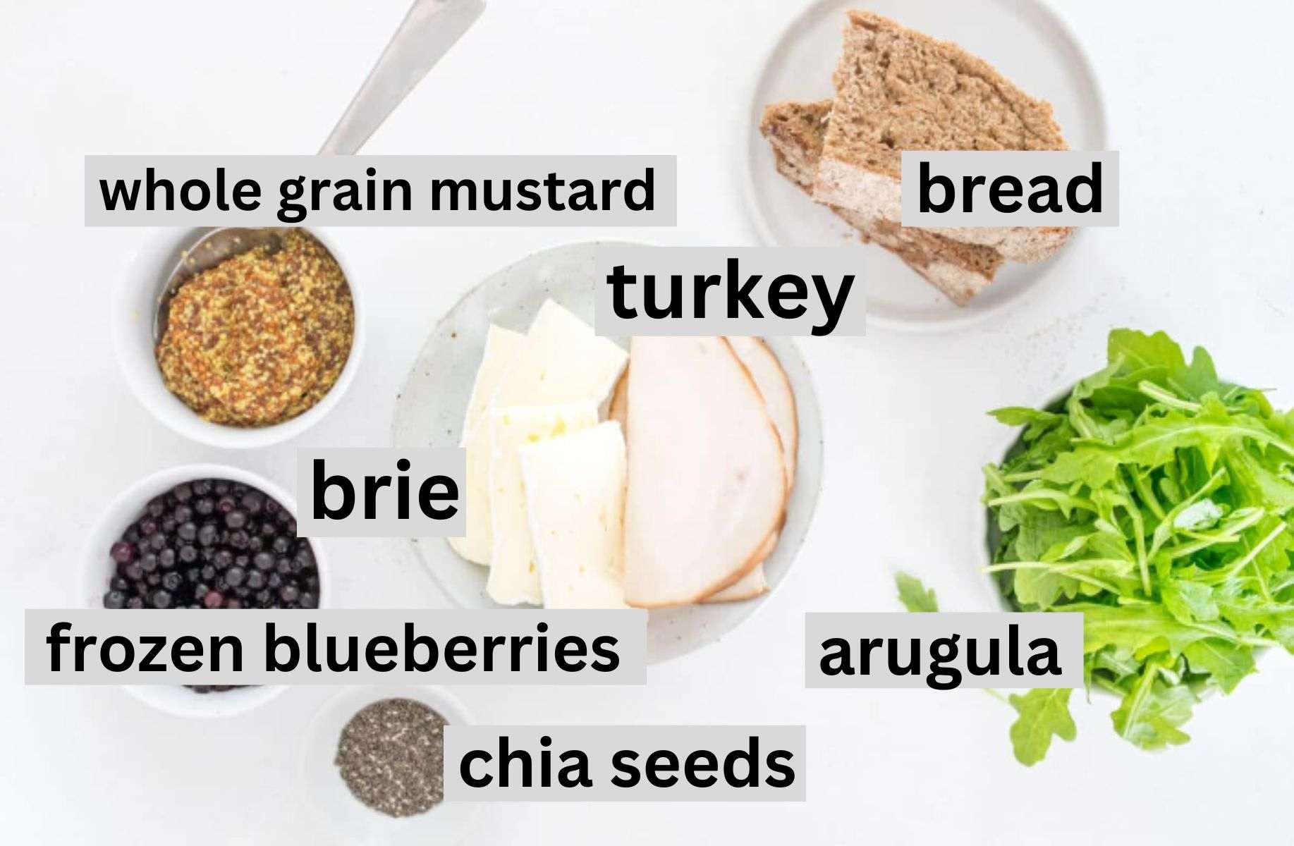 ingredients for turkey and brie sandwich on a table