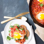 South African spiced Shakshouka on a white plate