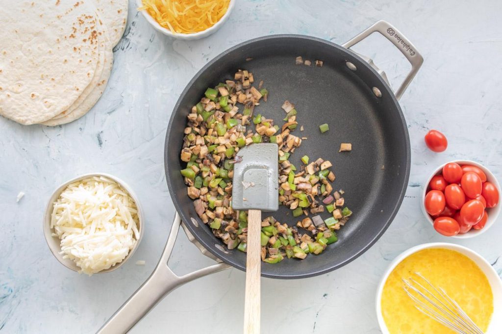 vegetables for breakfast tacos in a skillet