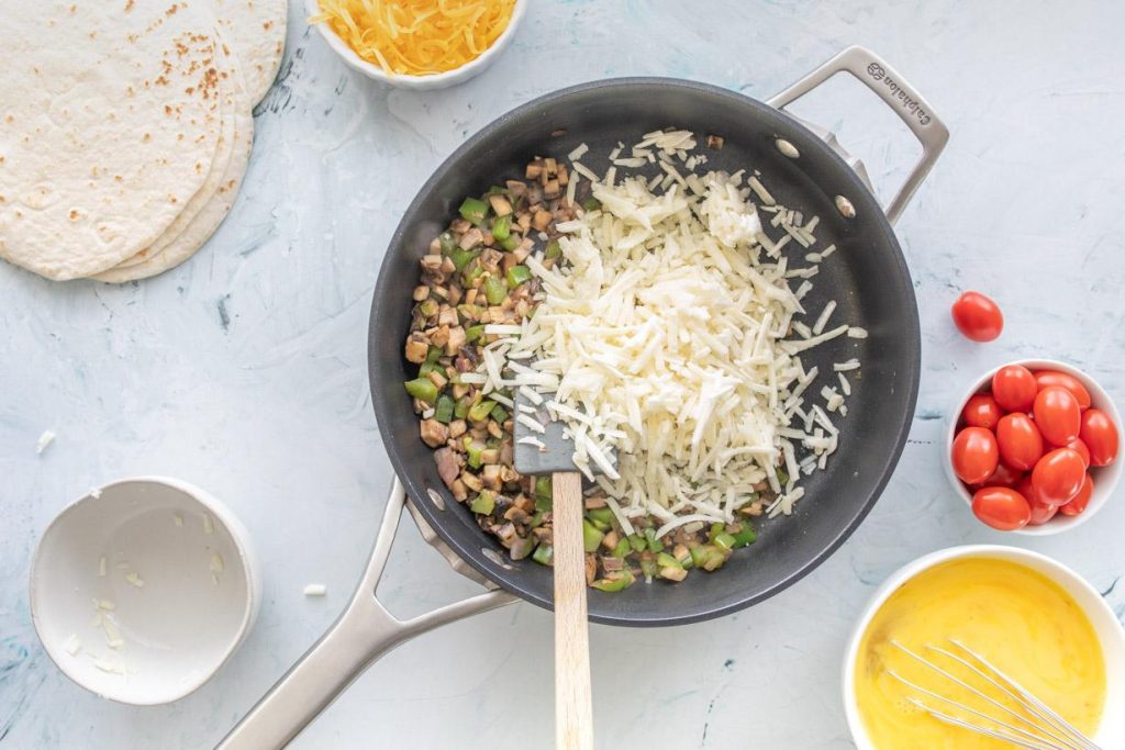 veggies and hashbrowns for healthy breakfast tacos recipe