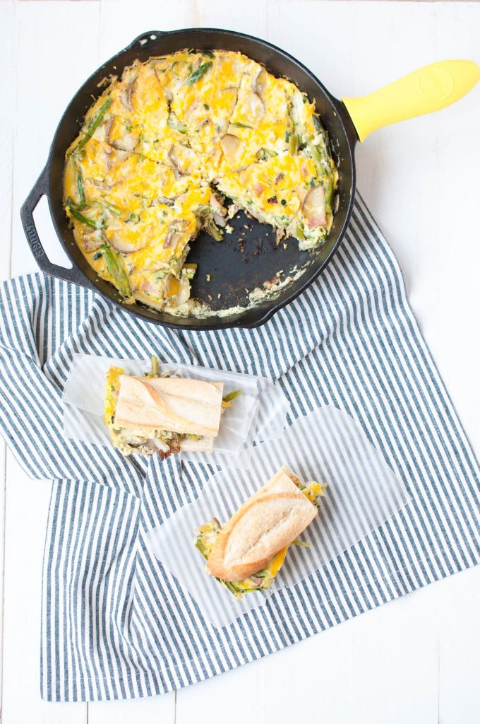 tortilla de patata on bread and in a skillet