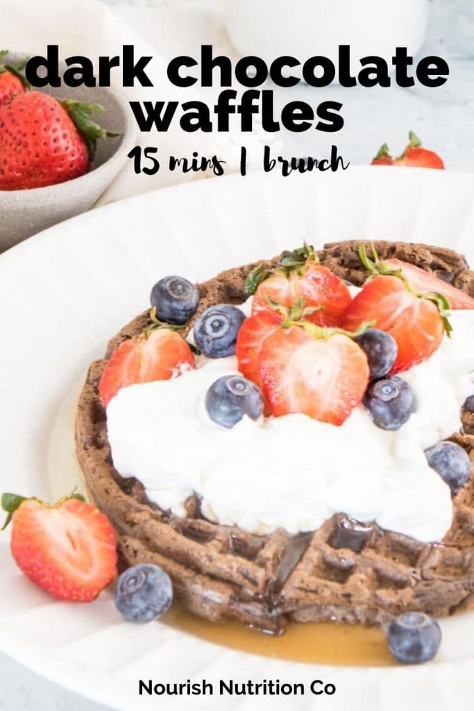 whole wheat mini chocolate waffles with cream and strawberries on table with text overlay