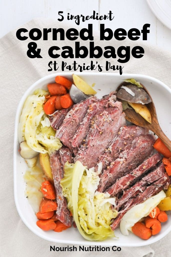 corned beef and cabbage on a white serving platter with text overlay