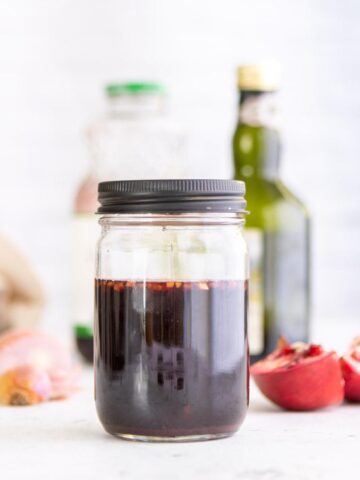 Pomegranate Balsamic Vinegar in a mason jar with ingredients in the background