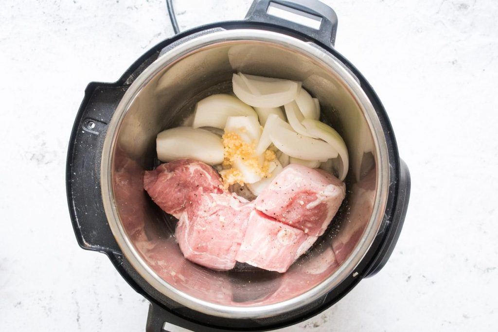 pork shoulder and onion in an instant pot