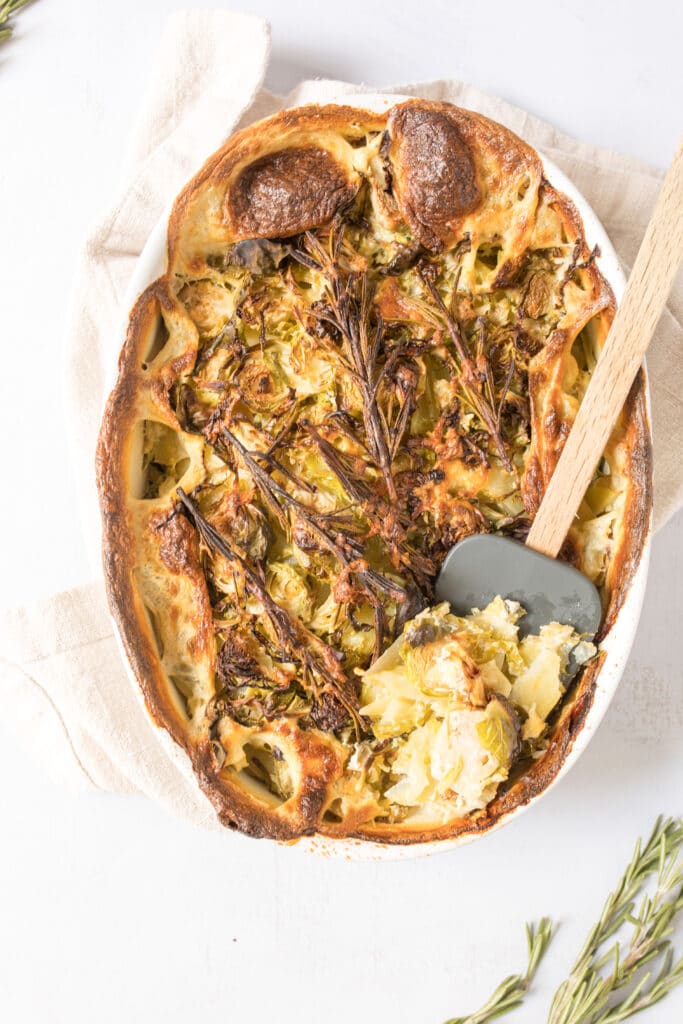 rustic potato and brussels sprouts au gratin in pan