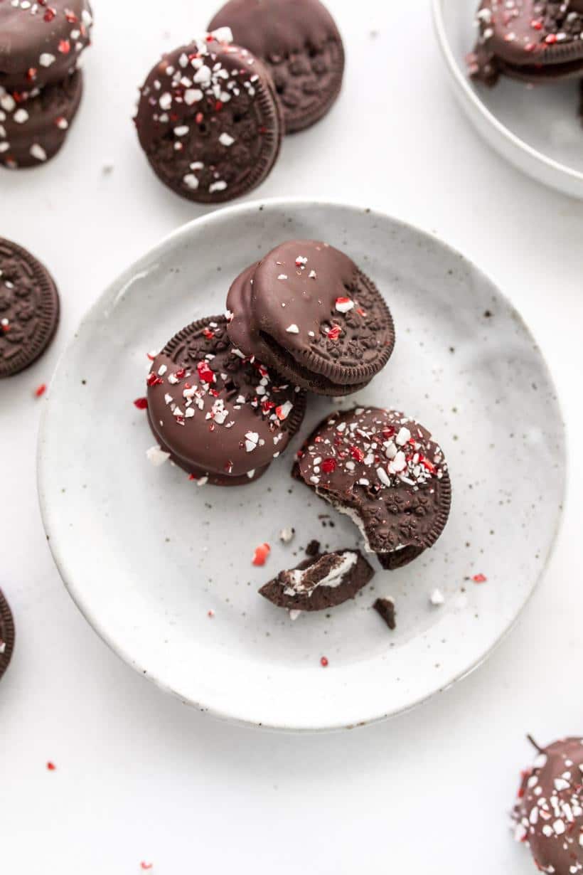 Chocolate covered oreo cookies with peppermint on a table