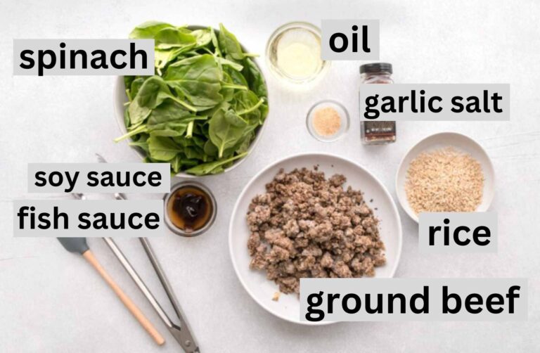 ground beef, baby spinach, and other ingredients for a Thai beef bowl on a table