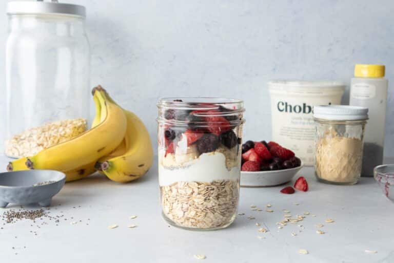 oats, Greek yogurt, bananas and chia seeds in a mason jar for overnight oats