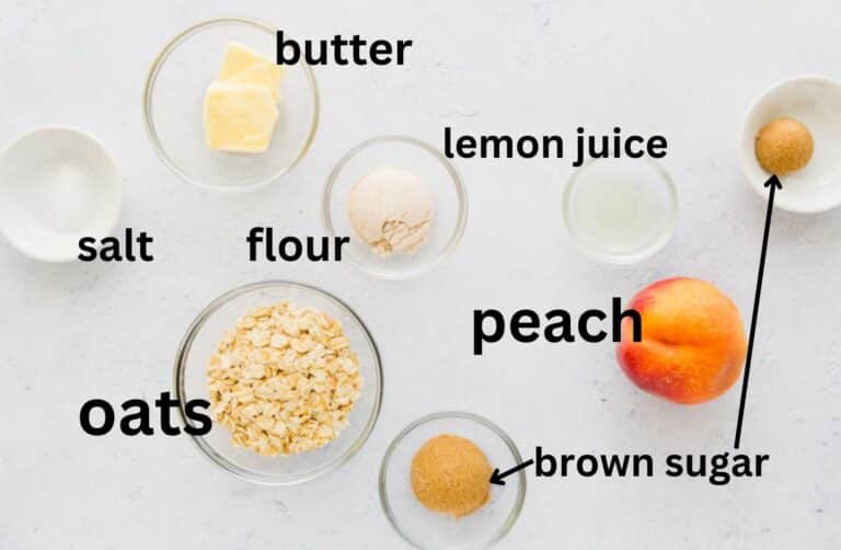 butter, flour, oats, sugars, peach on table