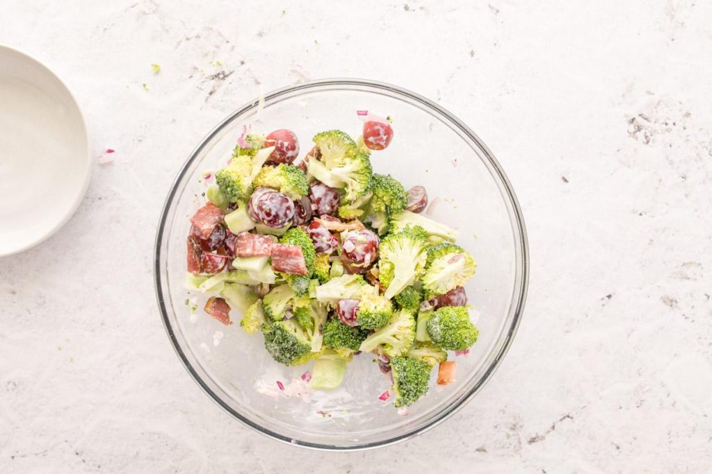 broccoli grape salad in a glass bowl