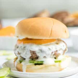 lamb burger with sauce on a bun