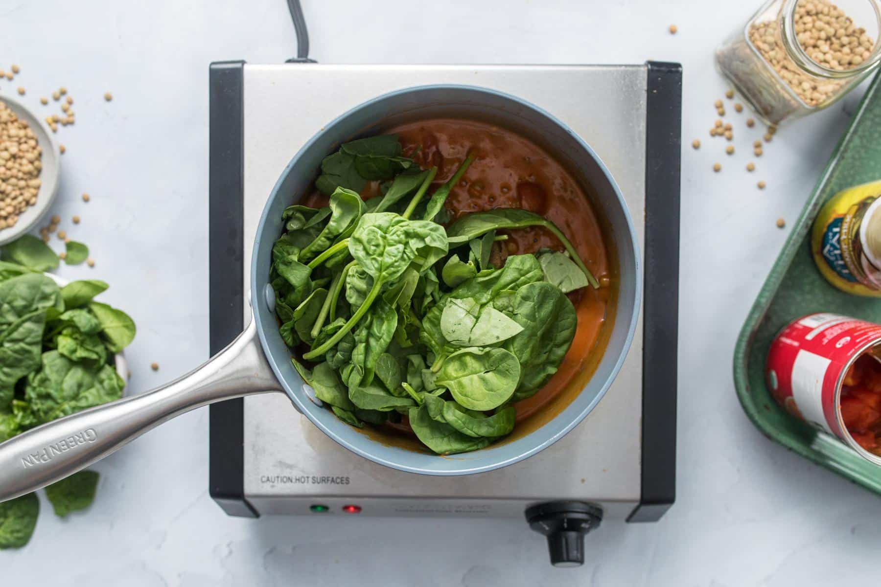 coconut lentil curry simmering in saucepan