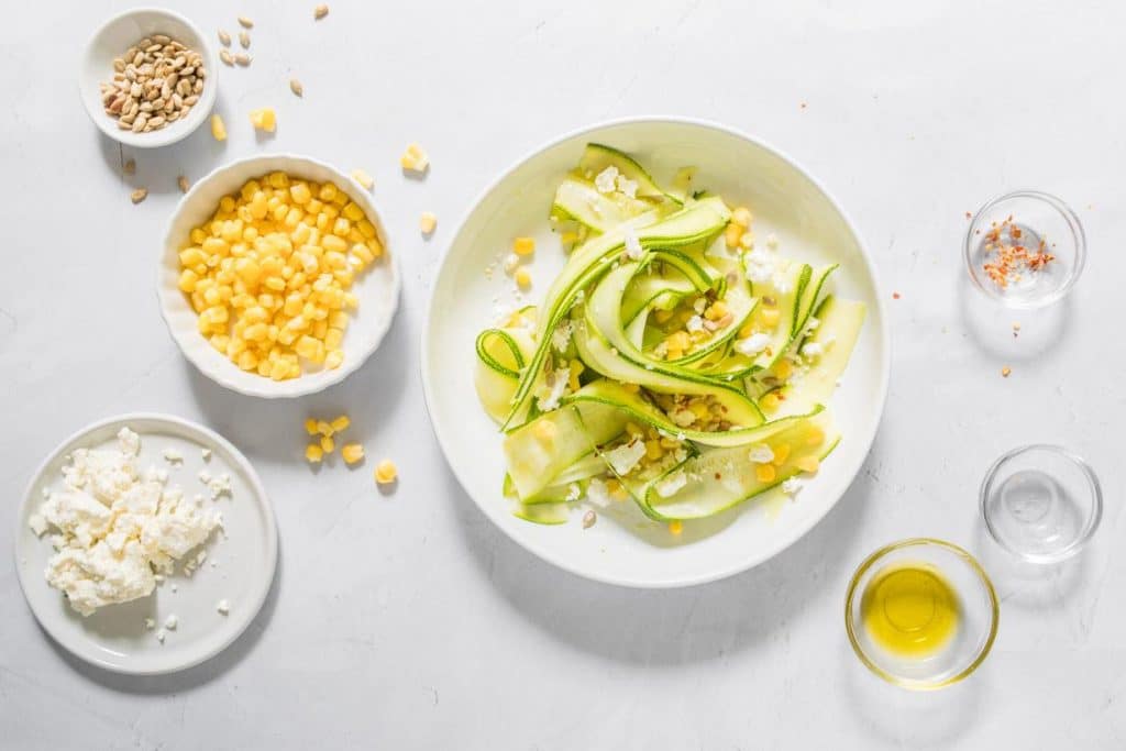 finished zucchini salad with feta on a table