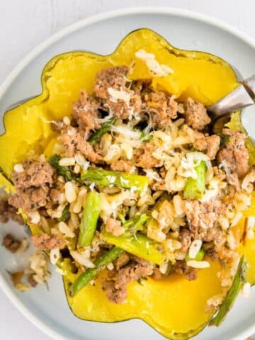 acorn squash stuffed with ground beef, rice, asparagus