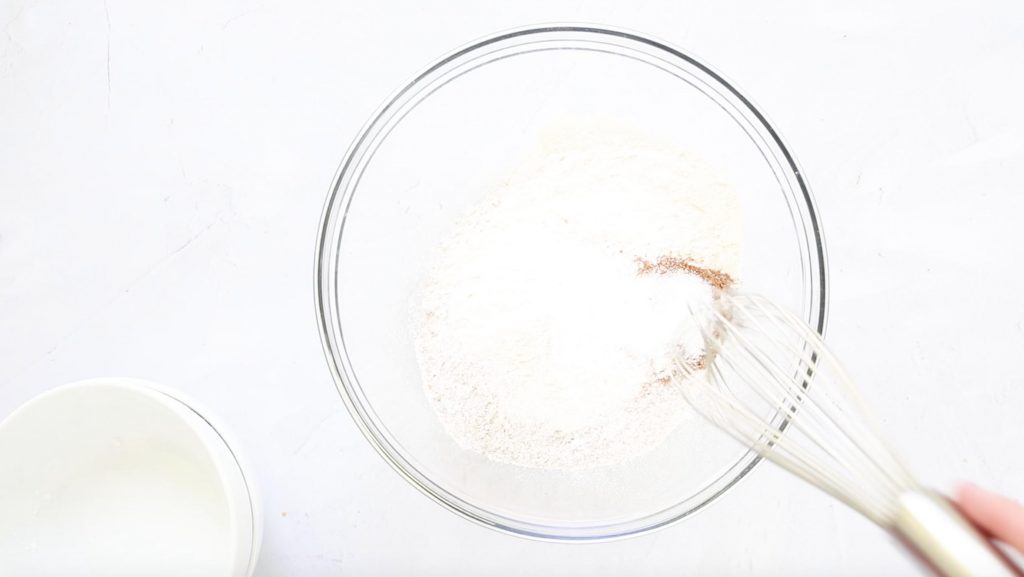 dry ingredients for pumpkin cake in a glass bowl