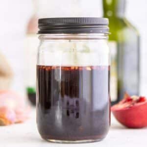 pomegranate juice in jar with black lid
