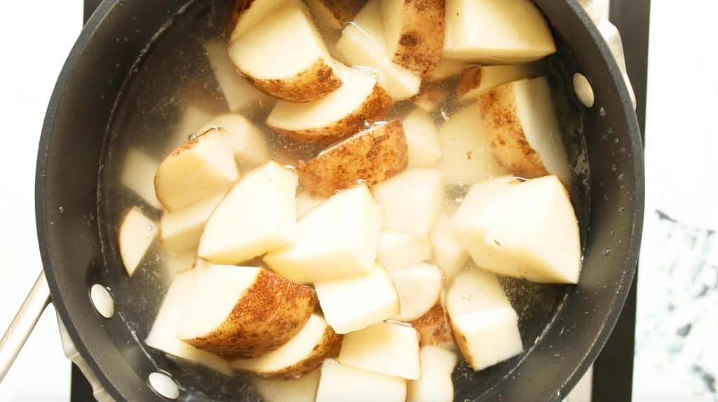 cubed potatoes in a stock pot