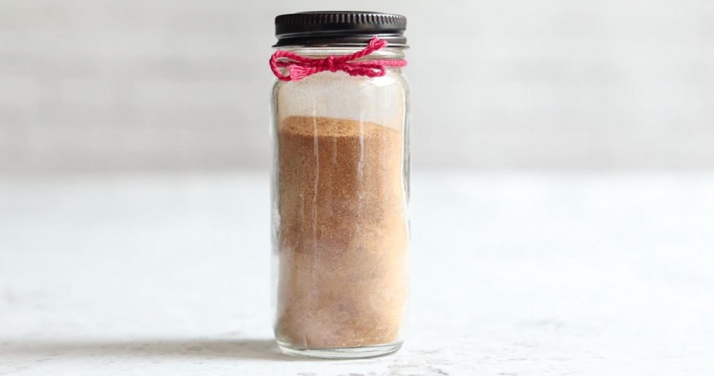 gingerbread spice in glass jar with red bow