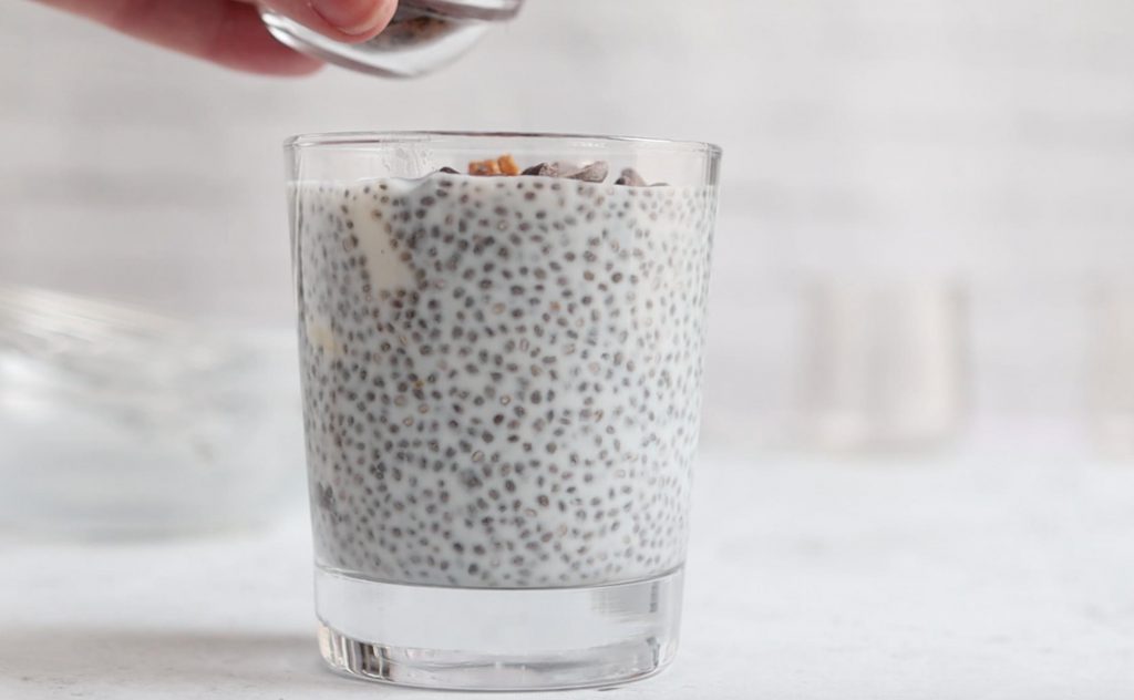 side shot of chia pudding in a short glass