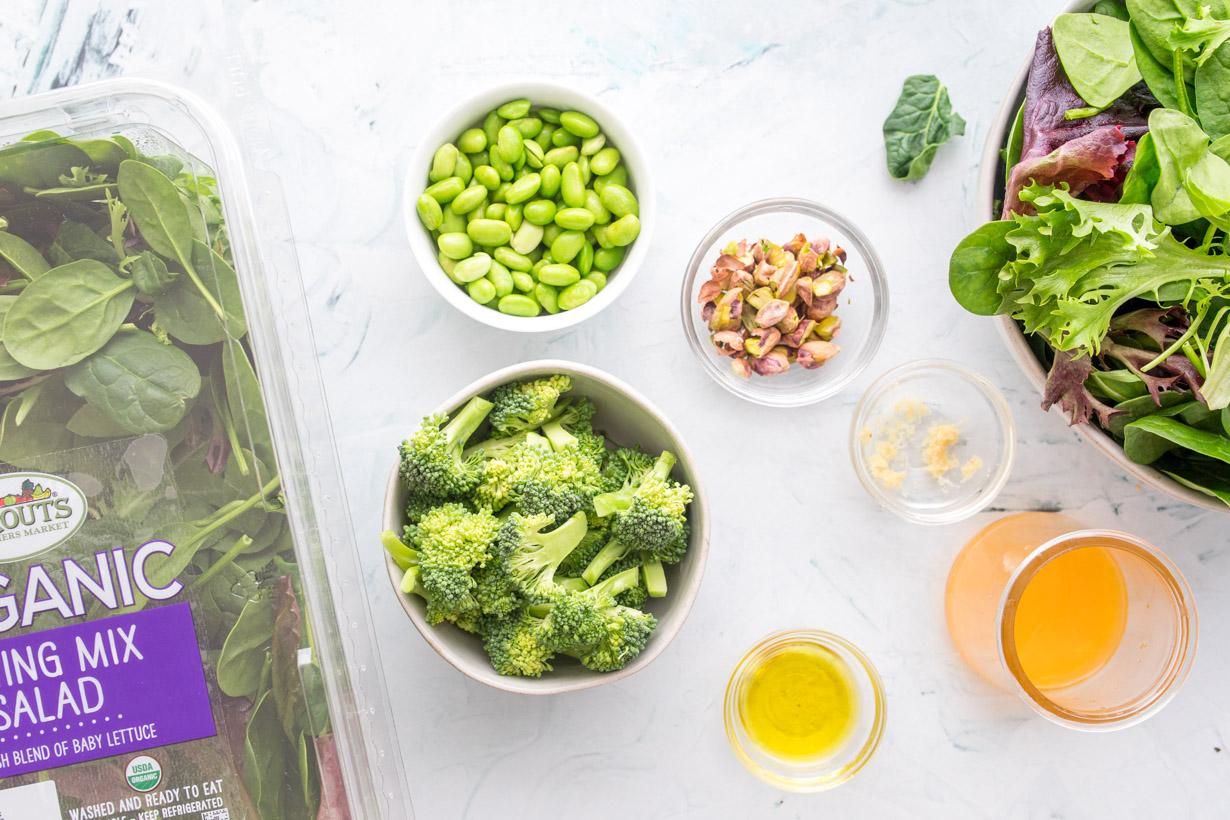 ingredients for spinach salad with mandarin oranges on a table