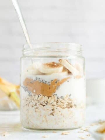 jar of oats with peanut butter, yogurt, banana