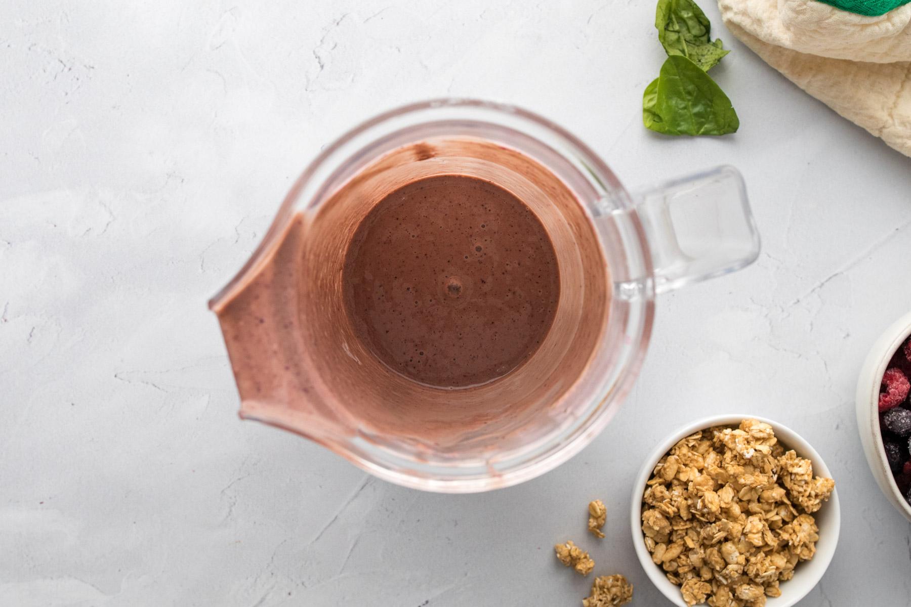 blended smoothie in a blender jar