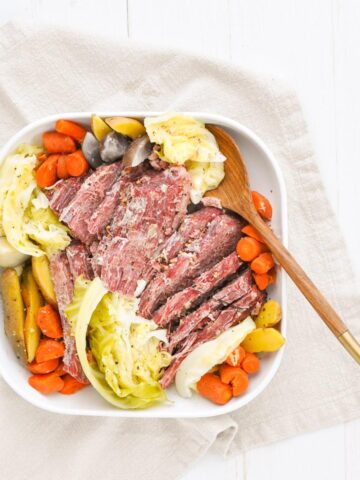 instant pot corned beef and cabbage in a white plate