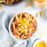 square image of black bean pasta with cheese in a bowl