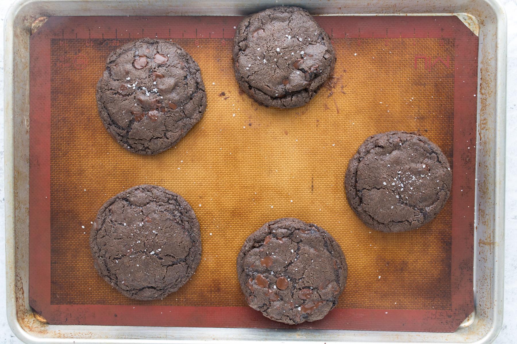 baked chocolate cookies on a cookie sheet