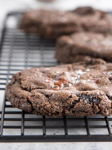 close up of double dark chocolate small batch cookies on a cookie sheet