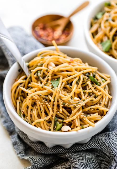 kung pao pasta in a white bowl