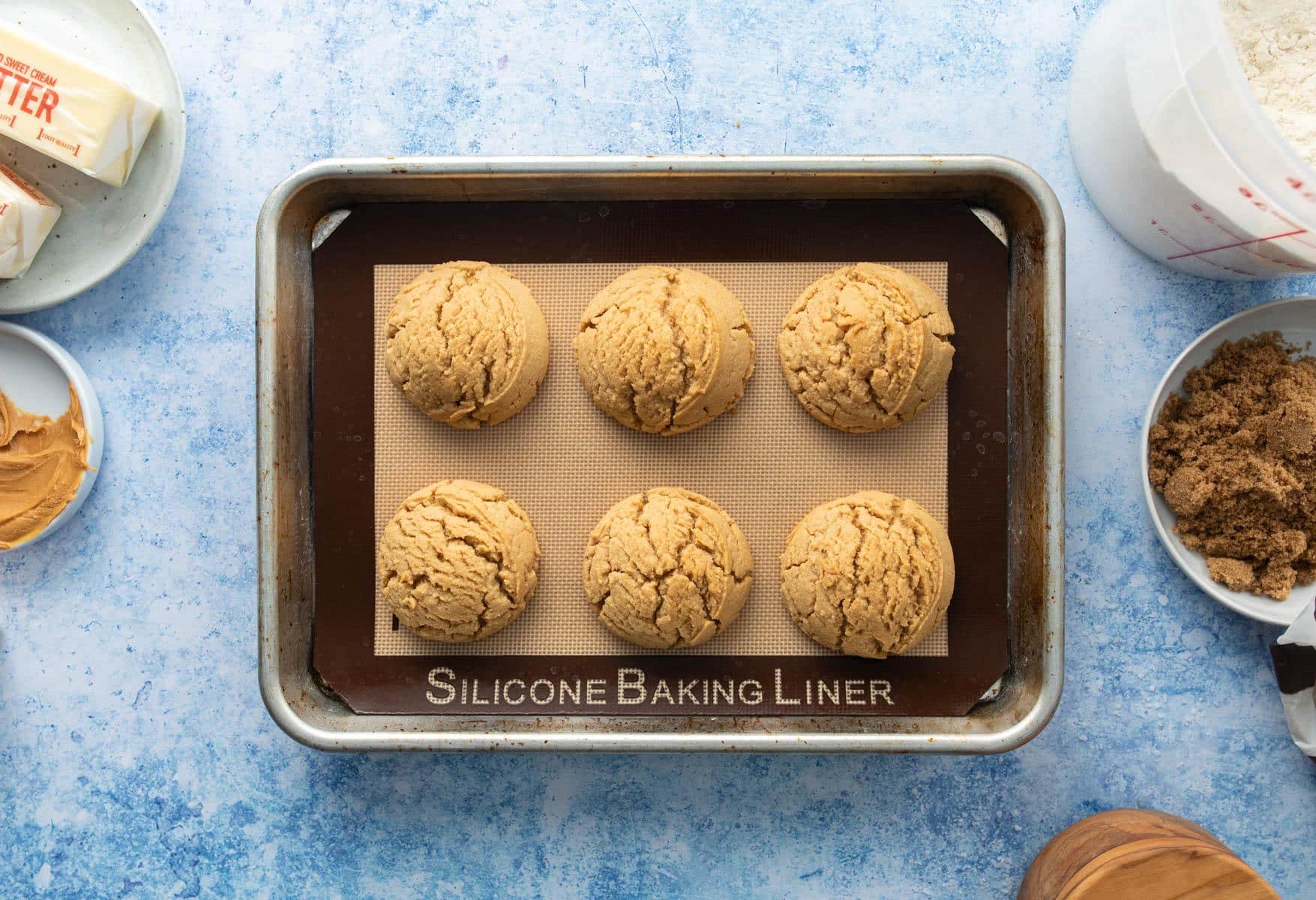 Adding a dollop of chocolate to a peanut butter cookie