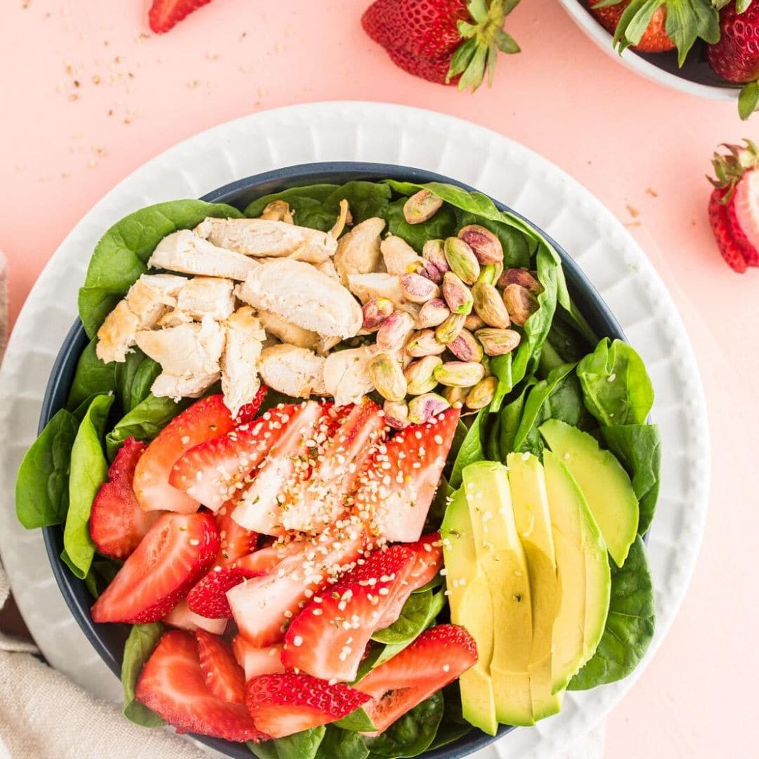 spinach strawberry salad in a bowl