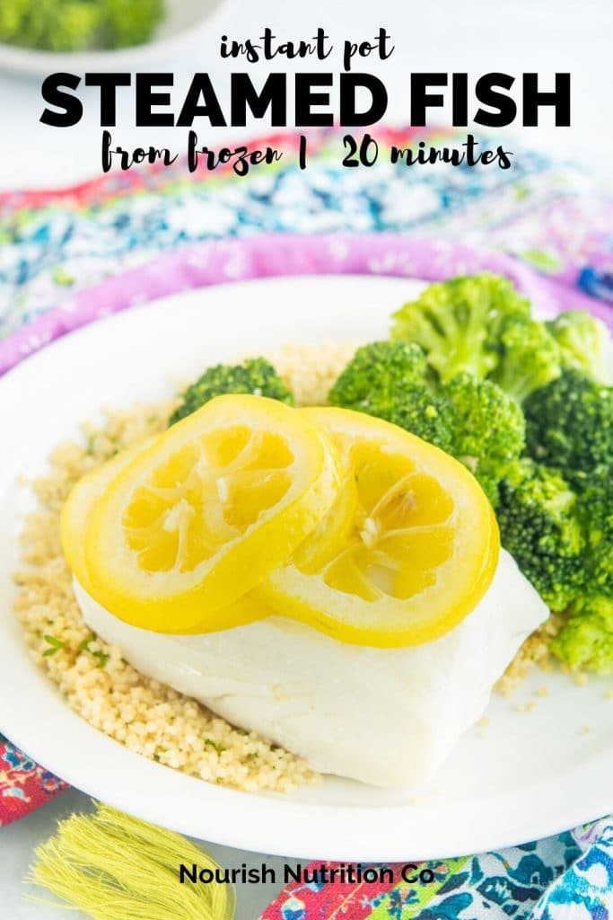 white fish with lemon slices on top on a plate with text overlay