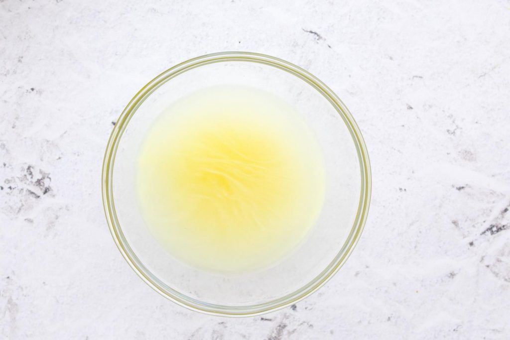 chicken broth in glass bowl
