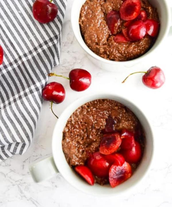 chocolate cherry chia pudding in 2 mugs