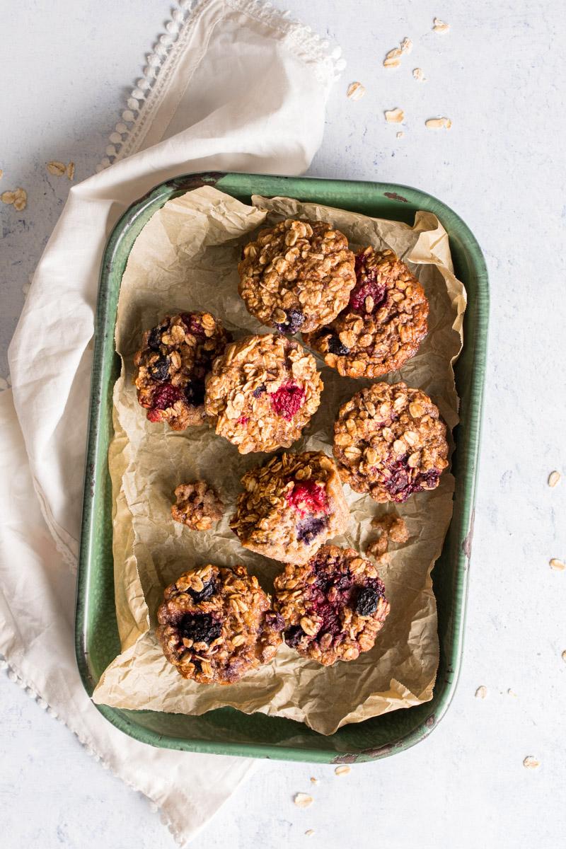 baked oatmeal cups in a green tray