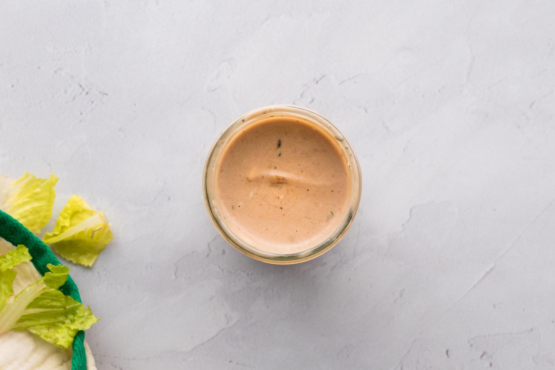 mixed barbecue ranch dip in a mason jar