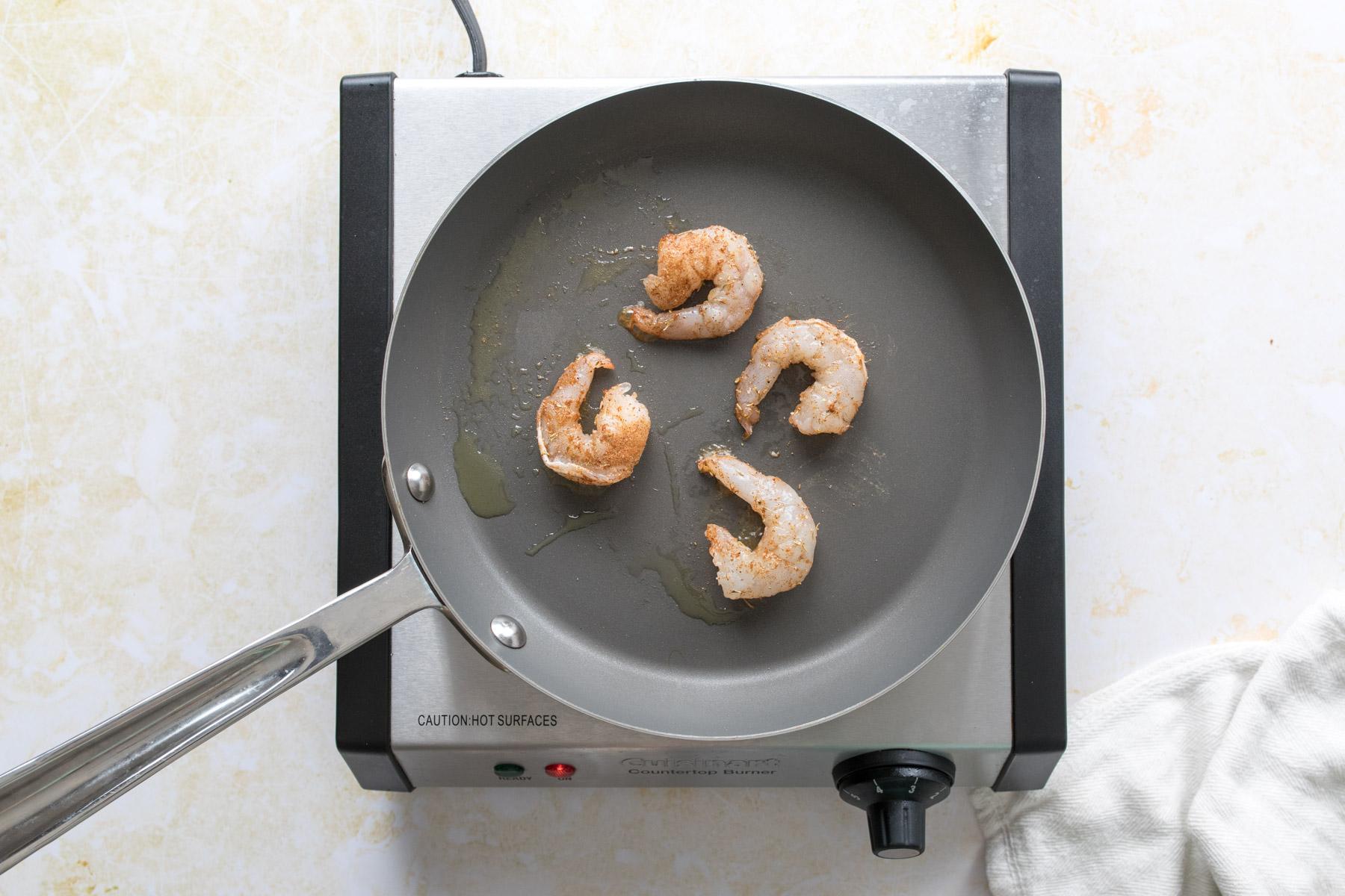 4 shrimp on a skillet