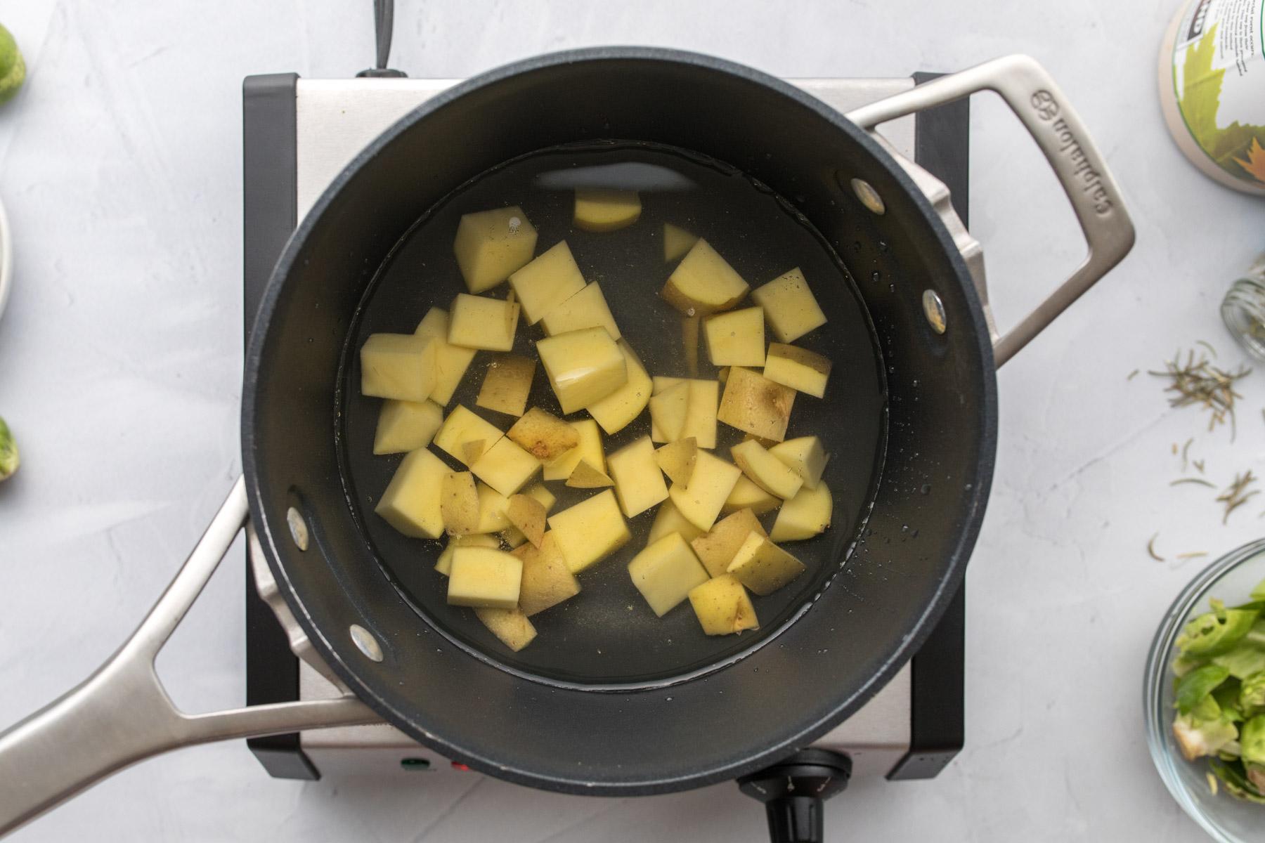 cubed potatoes in a pot
