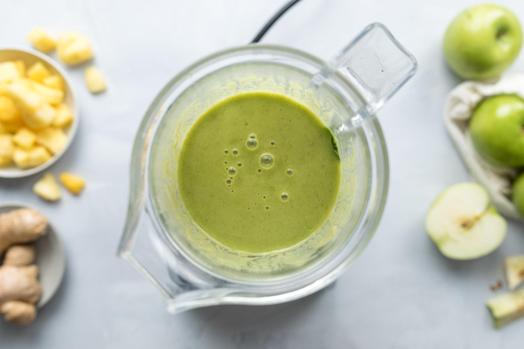 blended green smoothie in blender