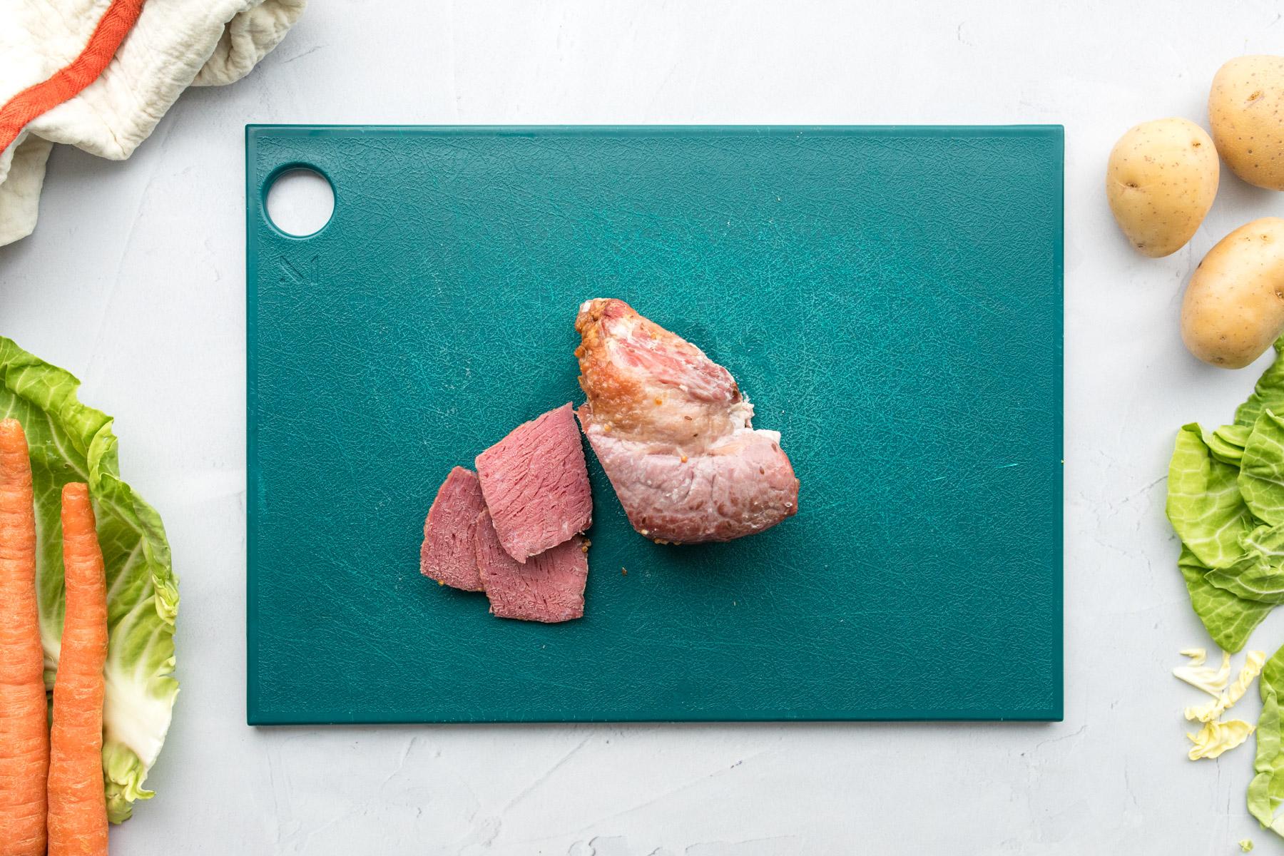 corned beef on cutting board