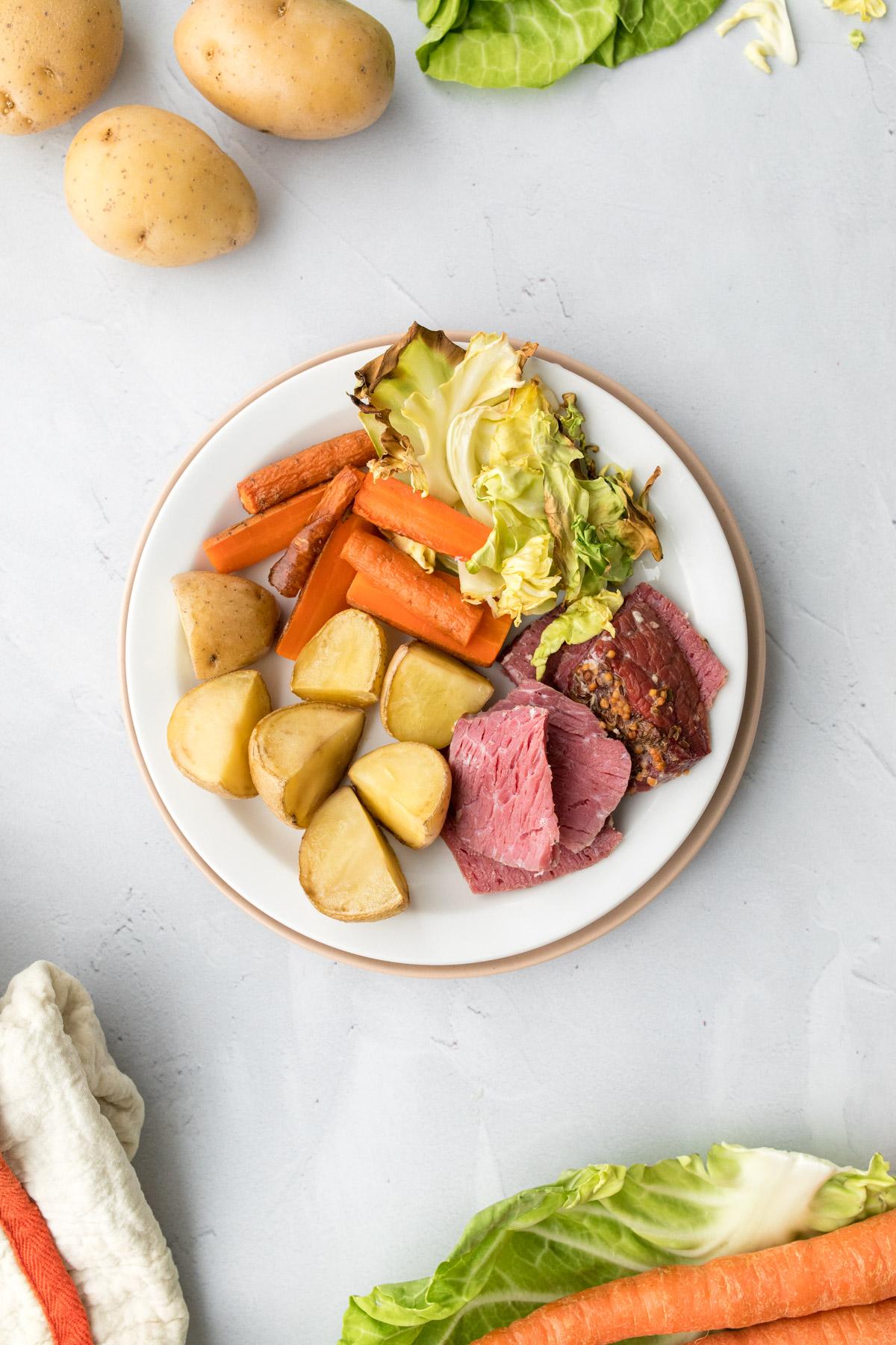 corned beef and vegetables on a plate