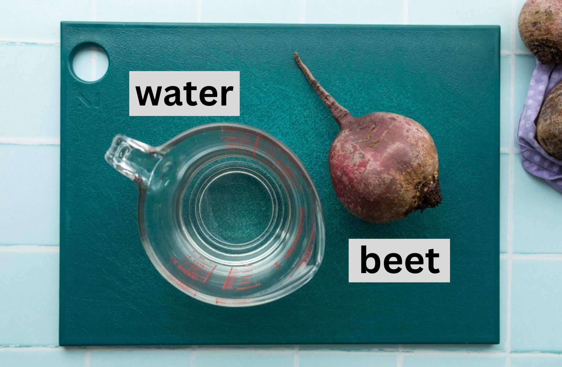 beet and water on cutting board