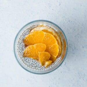close up of chia pudding with orange slices