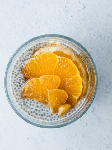 close up of chia pudding with orange slices