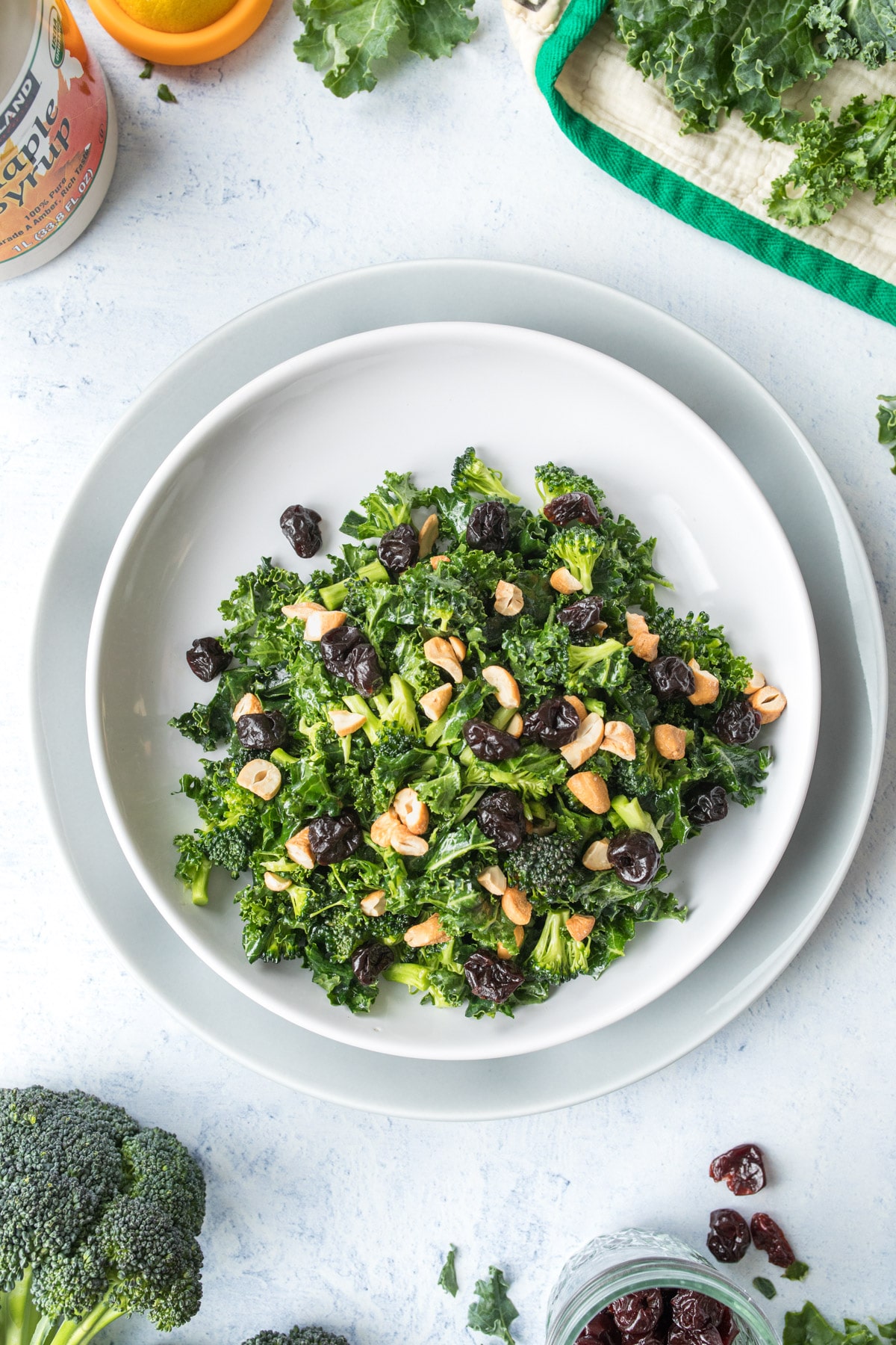 kale salad with dried cherries on top