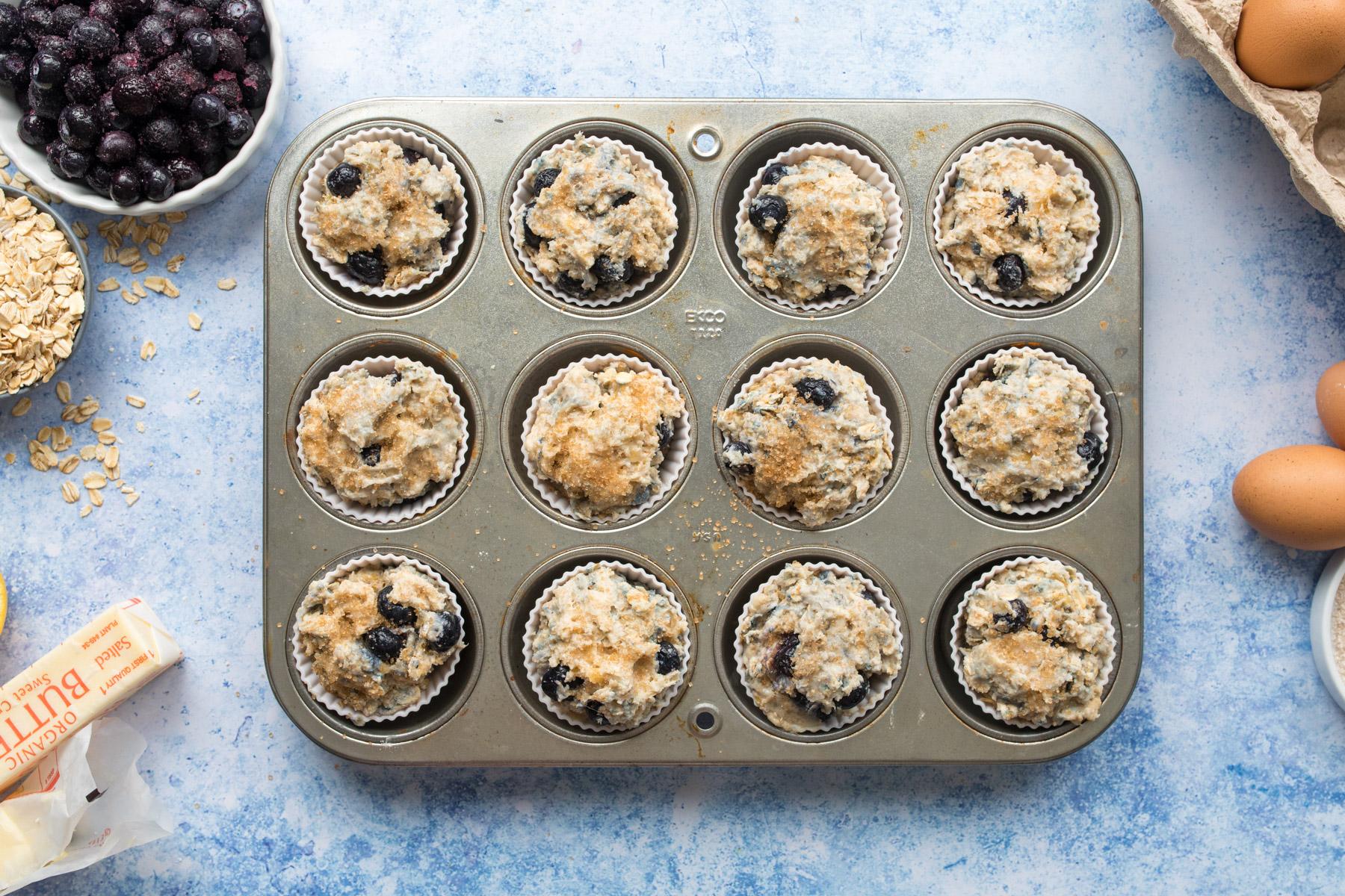 uncooked blueberry muffins with sugar