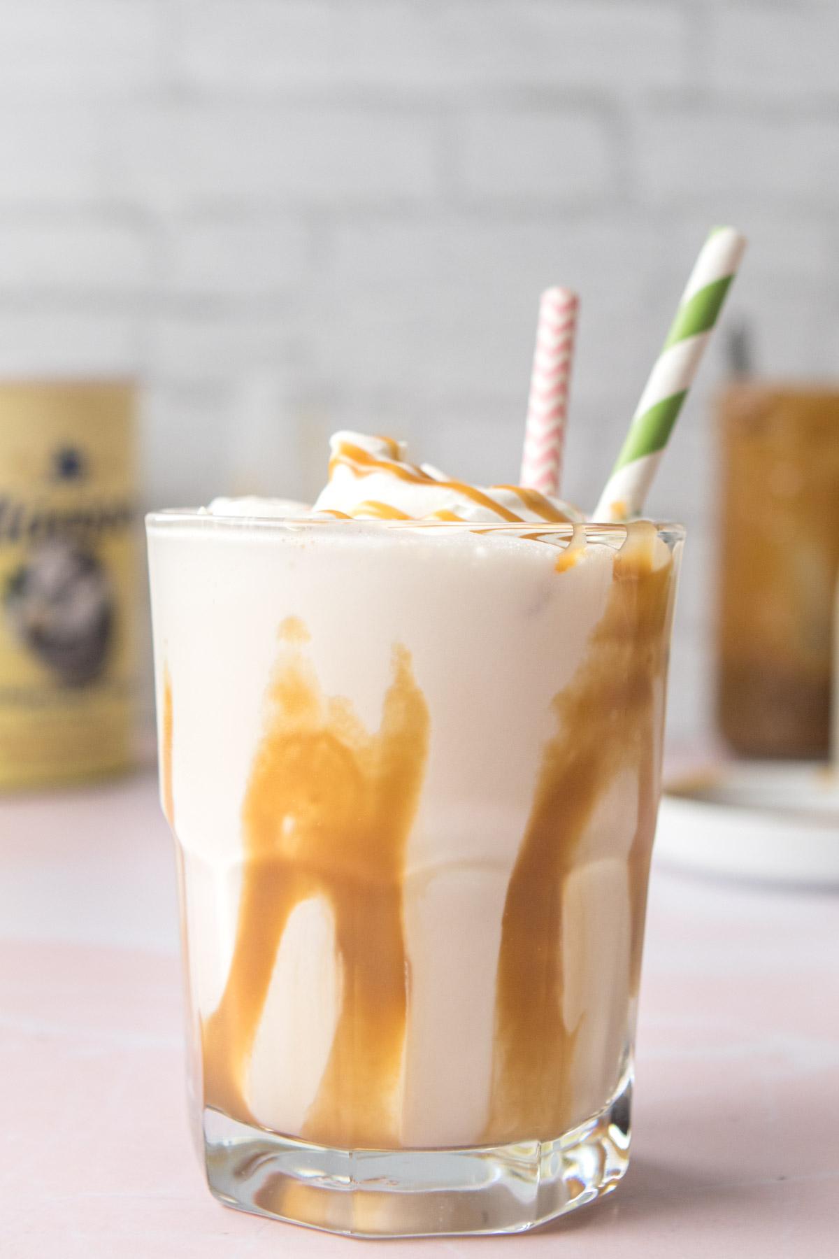 caramel shake in glass with caramel drizzle